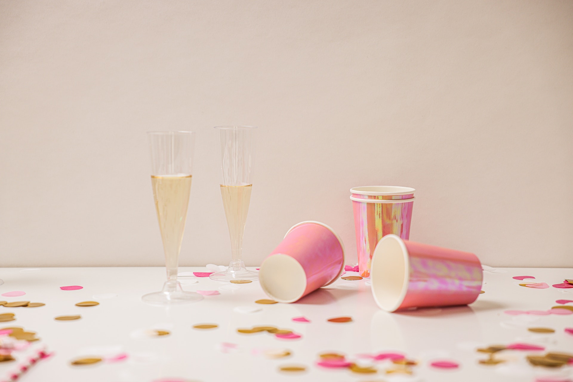 Party tablescape with champagne and colourful cups